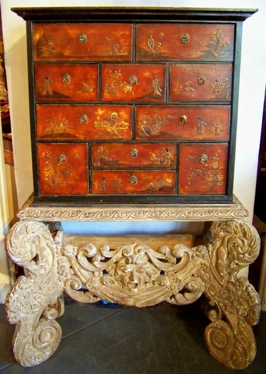 The cabinet on an earlier (circa 1650) Dutch baroque stand or 