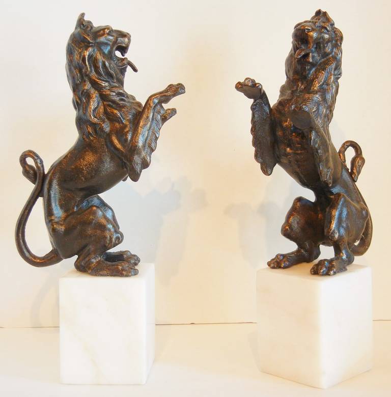 Gothic Revival Rampant Lion Bookends on Marble Plinths in Cast Iron