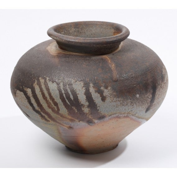 Natural chemical reactions define the glaze patterns in this stunning vase from Jeff Shapiro's wood-fired Anagama kiln at his studio in Accord, New York. This contemporary artist has pieces in the collections of The American Museum of Ceramic Art,