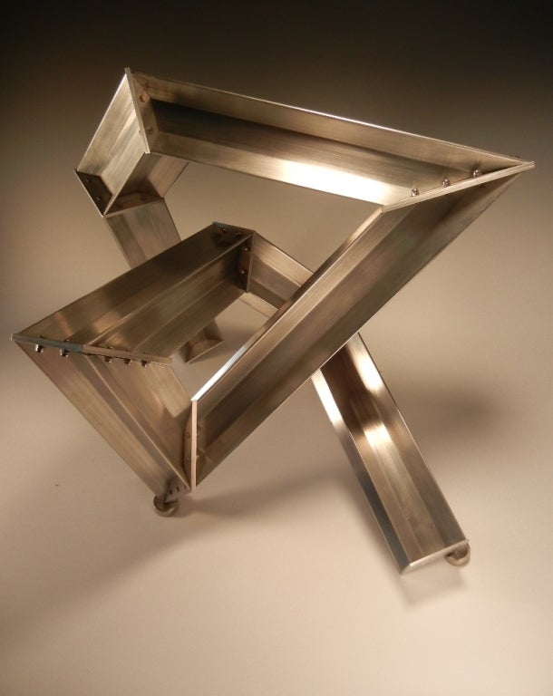 Tioga by Bilhenry Walker in aircraft-quality aluminum with stainless steel nuts and bolts. Tioga is a tabletop or pedestal sculpture by this innovative contemporary artist who is also known for his monumental outdoor installation art and his