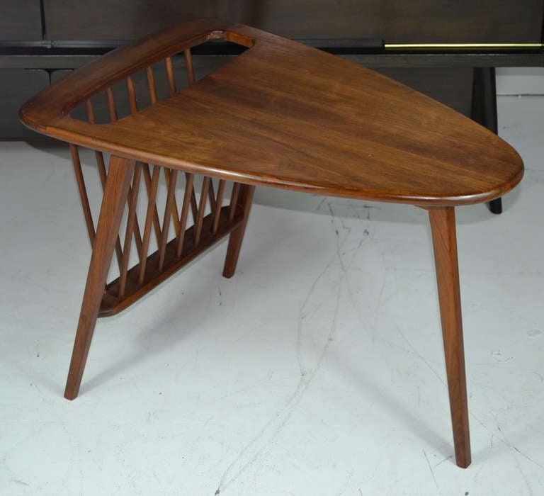 Walnut magazine table in the style of Jens Risom.