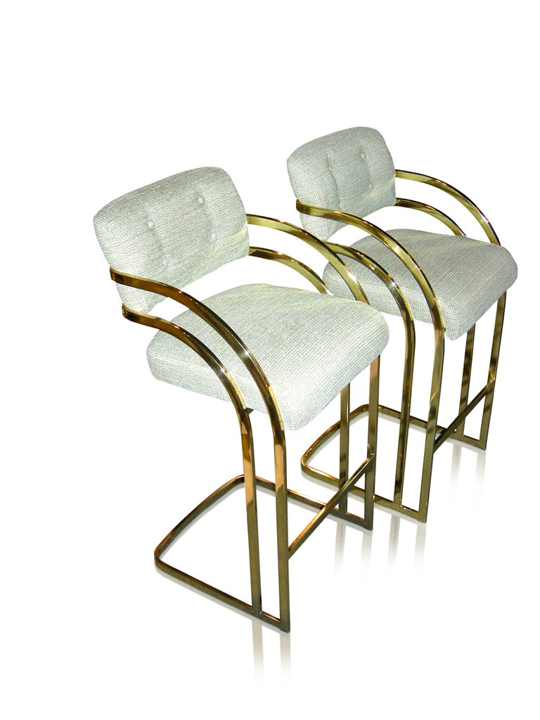 Gorgeous pair of mid-century bar stools attributed to Milo Baughman, exquisite cantilevered brass frames newly polished; also newly upholstered in green/gray chenille.