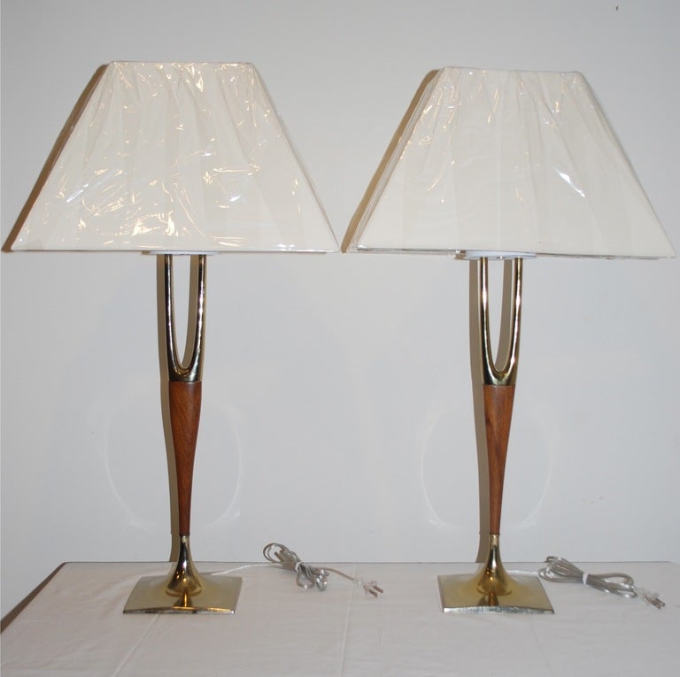 Pair of walnut and brass wishbone lamps. Newly polished and rewired.