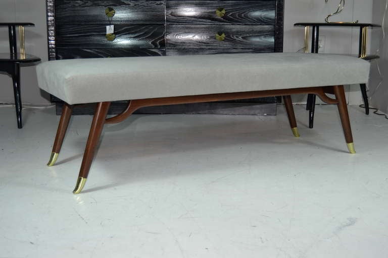 Very handsome and modern Italian bench circa 1960's. Newly refinished in natural walnut and upholstered in a fine grey wool.