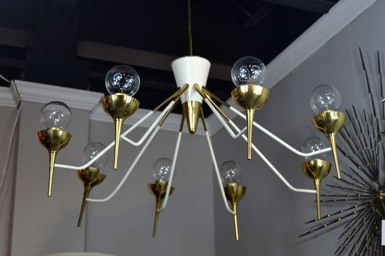 Stunning brass and white enameled Italian chandelier.
Newly rewired.