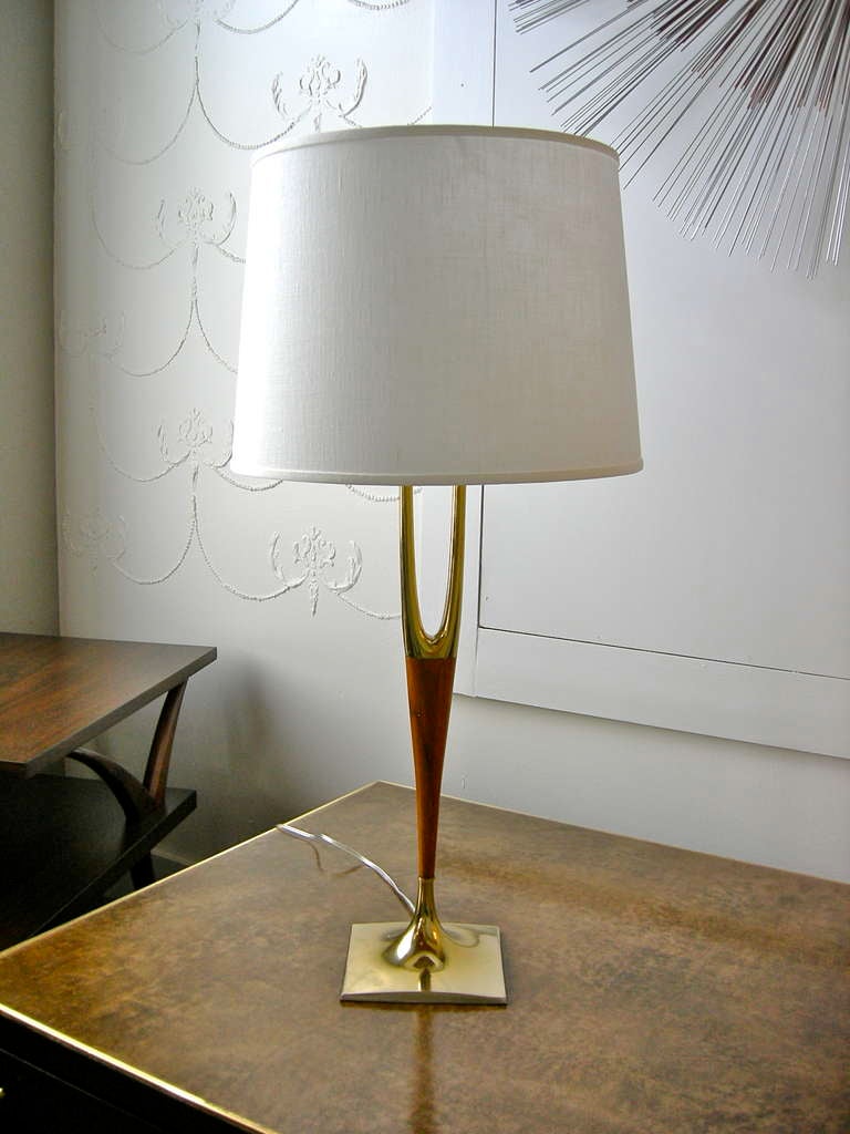 Pair of brass and walnut wishbone lamps by Laurel Co. Newly rewired.