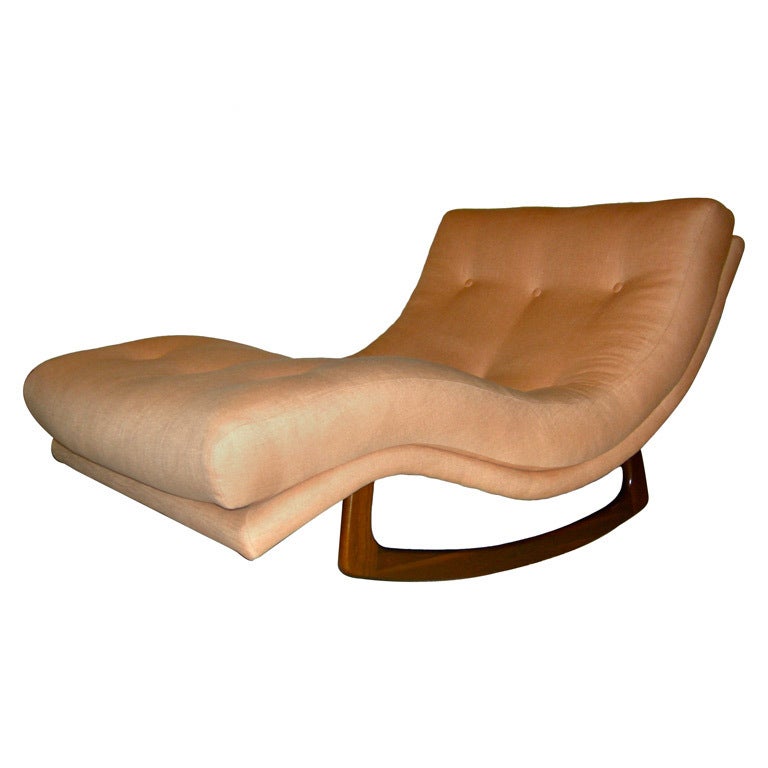 Double wide rocking chaise by American designer Adrian Pearsall. Newly upholstered in stunning apricot linen / silk blend. This piece provides ultimate relaxation for one or two. Walnut base newly refinished in a natural tone with a satin finish.