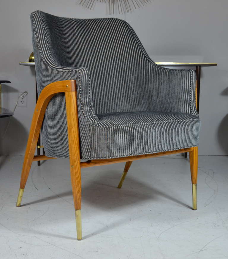 Rare model #5510 lounge chair designed by Edward Womley for Dunbar. Newly upholstered in blue/grey pinstriped textured velvet. Walnut frame newly refinished in natural.