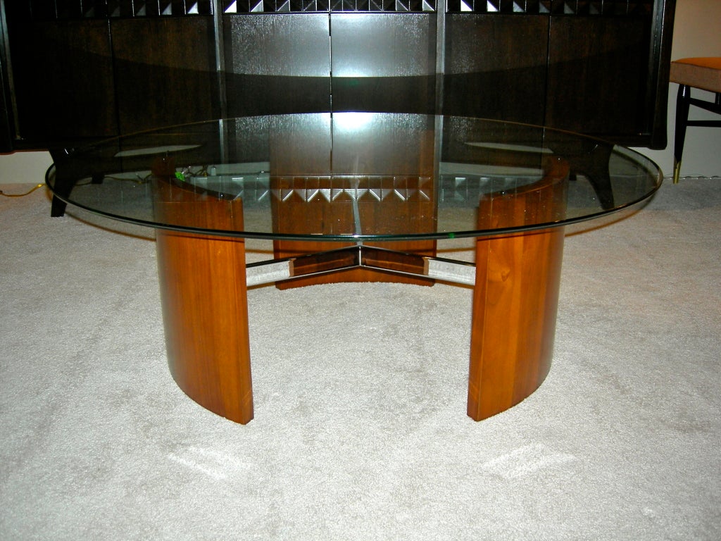 Fabulous mid-century RADIUS coffee table designed by Vladimir Kagan. Three arched teak wood panels appear to float effortlessly along a chrome stretcher, adding the perfect touch of modern design. Wood newly refinished in a natural tone, brand new