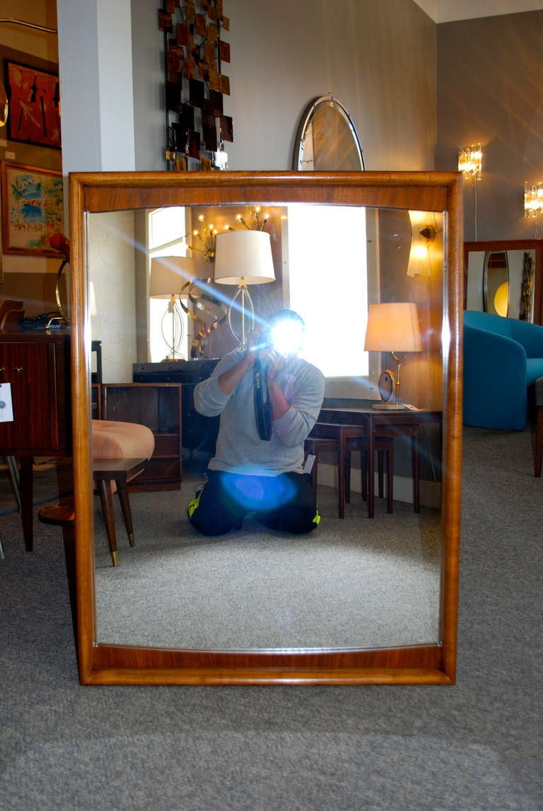 A newly refinished Mid-Century walnut mirror, newly refinished.