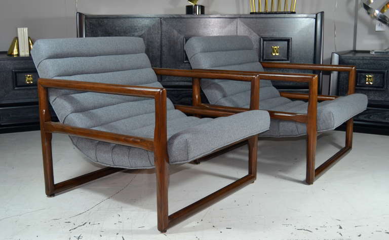 Pair of lounges designed by Milo Baughman for Thayer Coggin. Oak cube frames newly refinished in a medium tone. Channeled scooped seats newly upholstered in a very subtle grey.