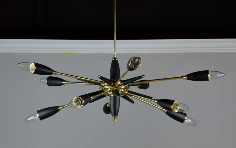 Rare ten arm sputnik chandelier manufactured in Italy circa 1950's. Newly polished, rewired and ready to hang.