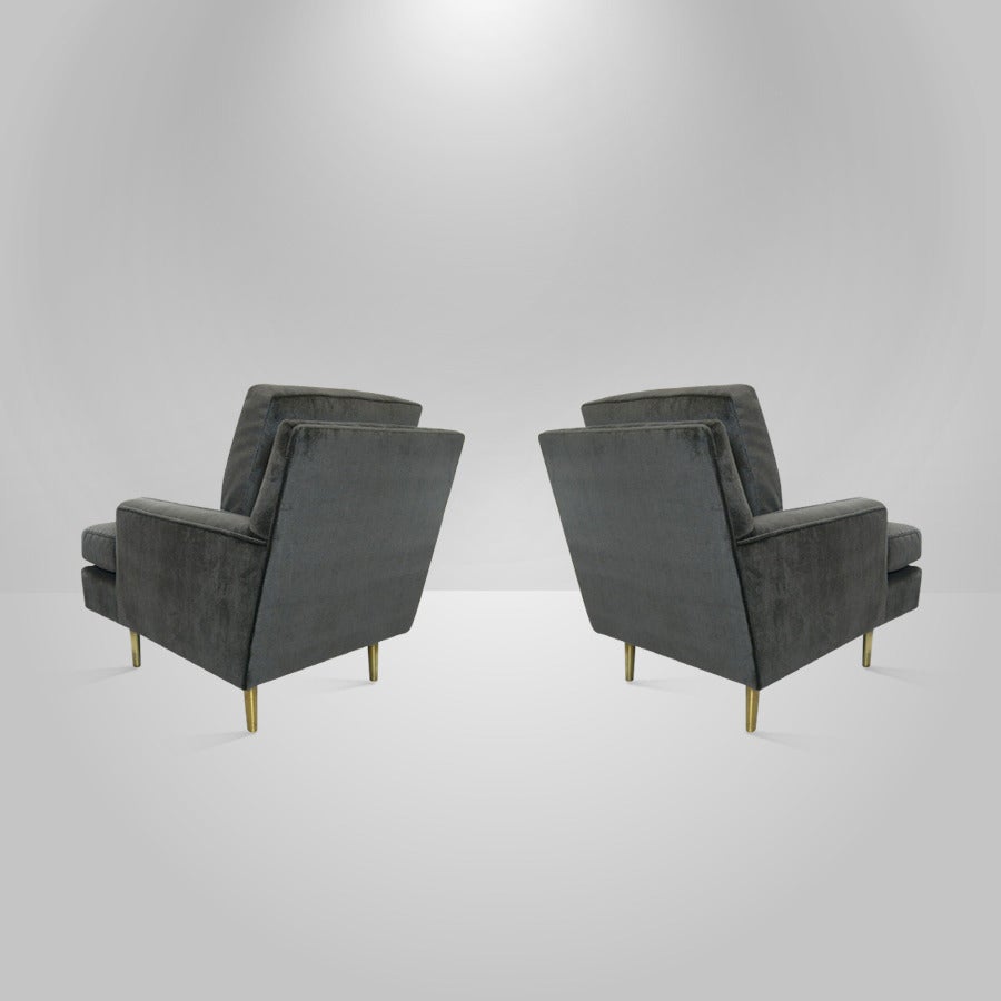 Stunning pair of Mid-Century Modern lounge or club chairs designed by Edward Wormley for Dunbar.

Newly upholstered in smokey grey mohair.