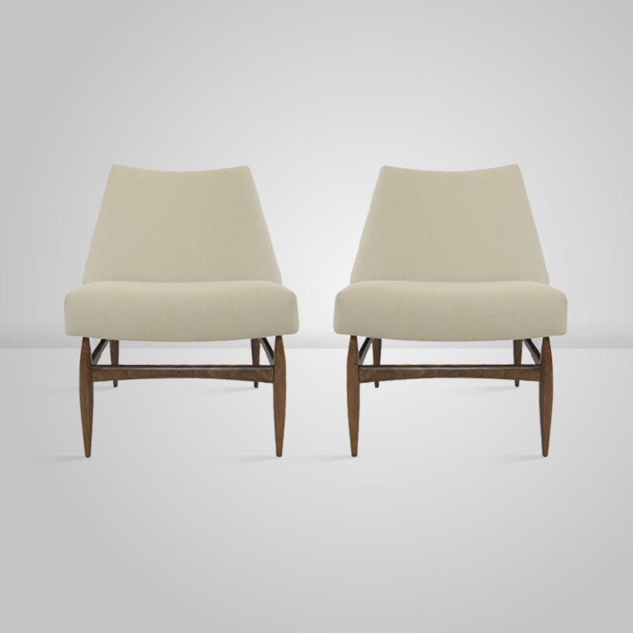 Pair of Italian slipper chairs in beige wool.