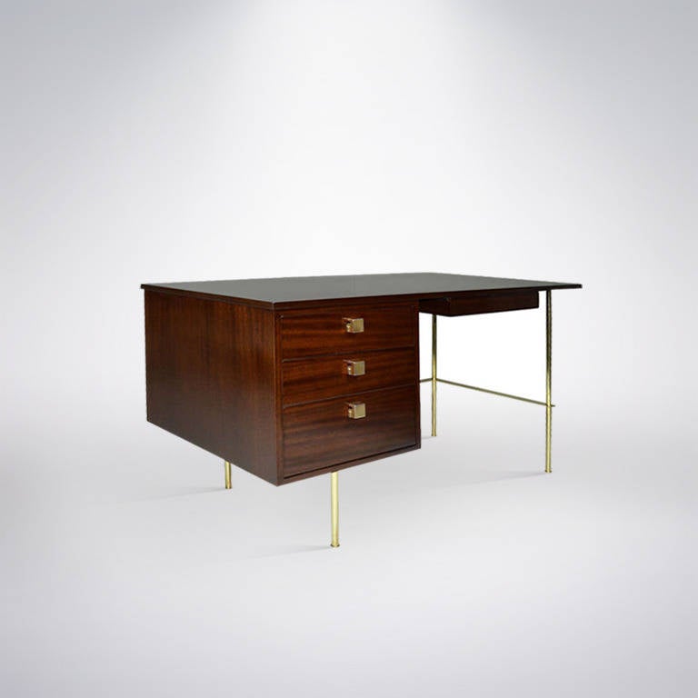 Mahogany desk by Harvey Probber. Newly refinished, brass newly polished.