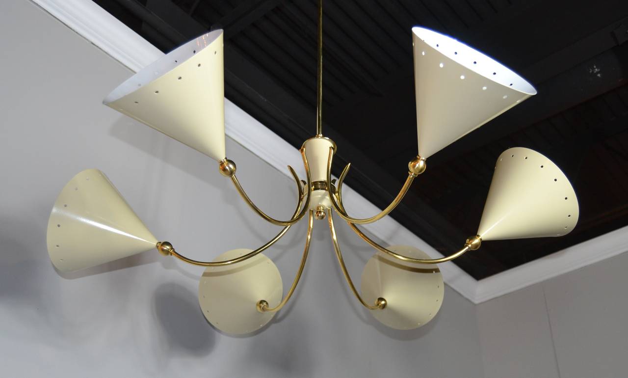 Large-scale chandelier in the style of Angelo Lelli, manufactured in Italy, circa 1950s. Featuring eight arms ending in oversize conical ivory enameled shades. Newly polished and rewired.