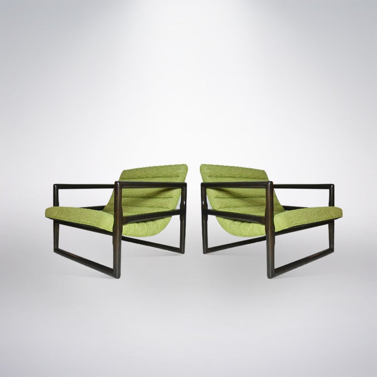 Pair of stylish channeled lounges designed by Milo Baughman for Thayer Coggin. Solid oak frames have been newly refinished in a rich dark chocolate tone. Newly upholstered in green, silvered speckled chenille.