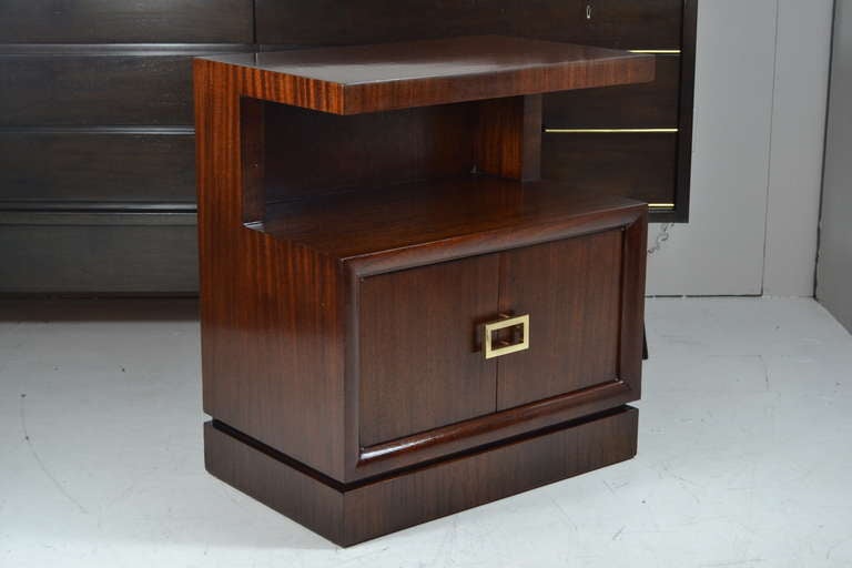 Pair of tiered mahogany cabinets / consoles newly done in natural tone w/ a French polished finish.
