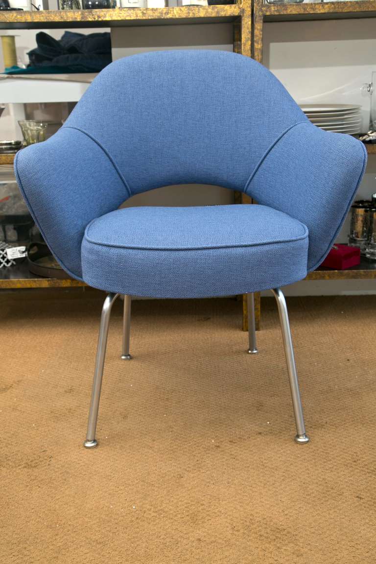 The Classic Eero Saarinen chair, Manufactured by Knoll Furniture and custom upholstered in a quality Light Aubergine fabric. Multiples are available and we are C.O.M. capable. Please call for pricing.