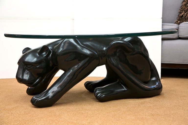 The black panther is posed in a low to the ground stealth mode. Quite the conversation piece! 3/4
