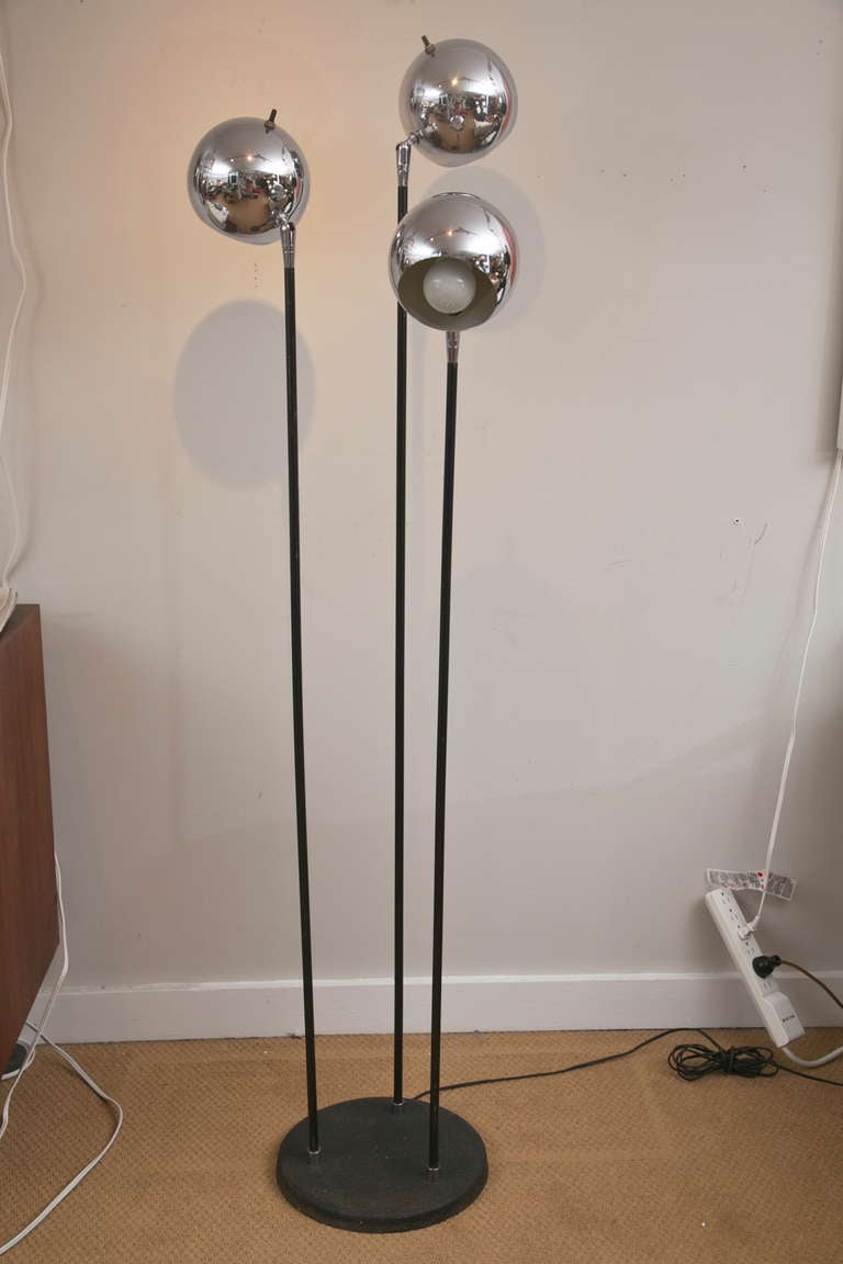 The classic floor lamp with 3 independent chrome ball heads in all original condition. Attributed to Robert Sonneman. Over-all very good condition with some paint loss on the interior of the chrome spheres, due to age.