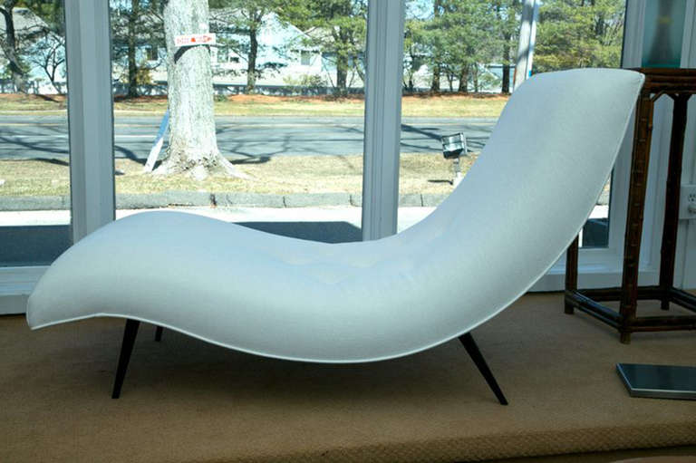 Classic early 1960s chaise designed by Adrian Pearsall. Custom upholstered in a quality button-tufted white linen. The tapered legs have been ebonized. Excellent condition.