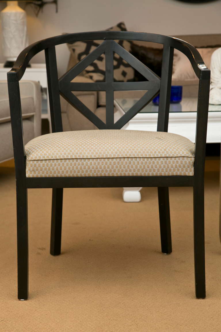 Originally deigned by Josef Hoffman in 1910 for the Villa Ast, our set of four chairs are in excellent condition with the original upholstery. Manufactured in Austria by Wittmann Furniture.