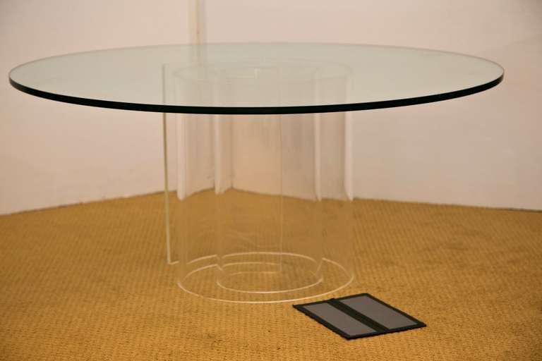 Mid 1970's snail-base lucite table in a great size and in excellent condition.