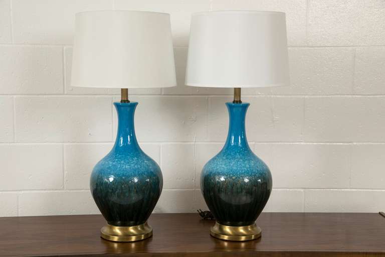 A pair of all original, excellent condition Ceramic lamps with excellent proportions, and fantastic color. Custom shades.