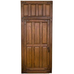 Vieille porte en fer et bois