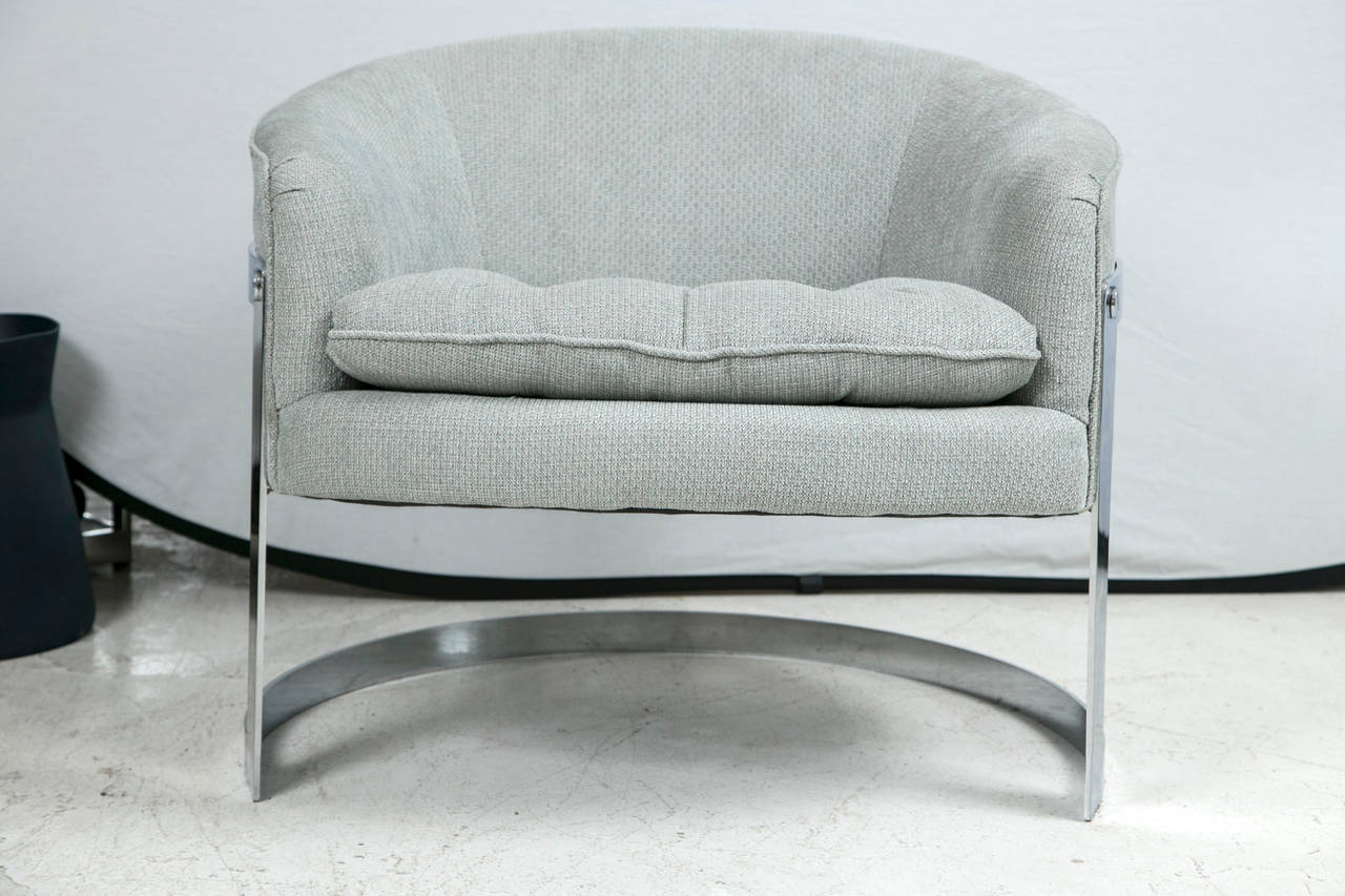 This chair is all Milo Baughman! Amazingly proportioned with just the right amount of chrome accents as its support. Custom upholstered in an age appropriate Ralph Lauren textured textile. Tufted seat just as the original design called for. An