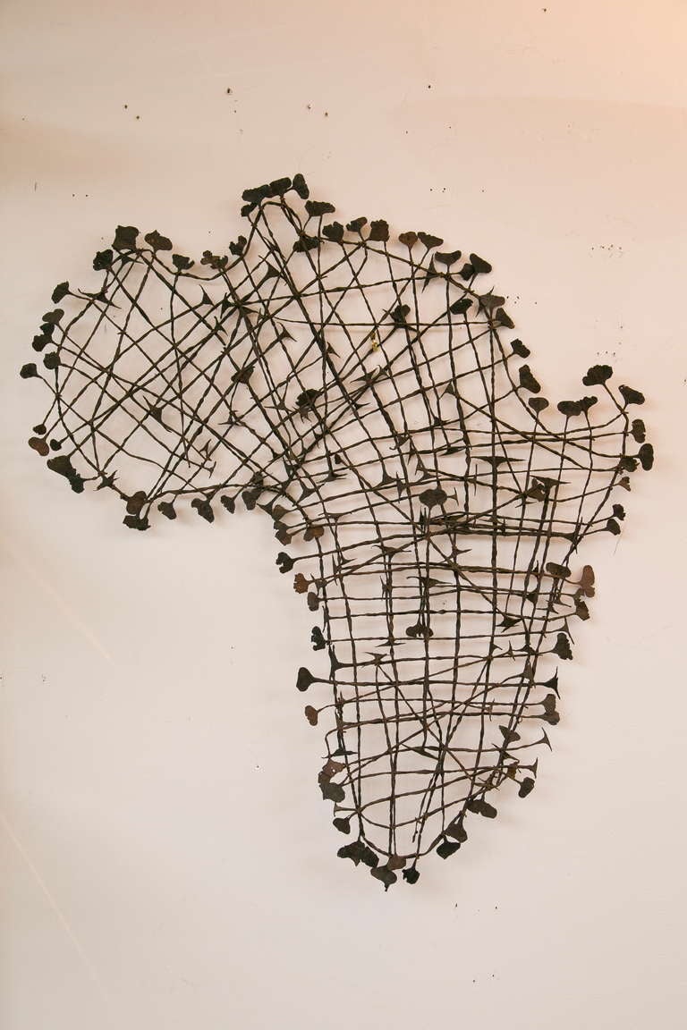 Vintage hand-fashioned twisted iron representation of the African  continent.