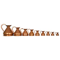 Set of 9 Copper Measuring Pitchers