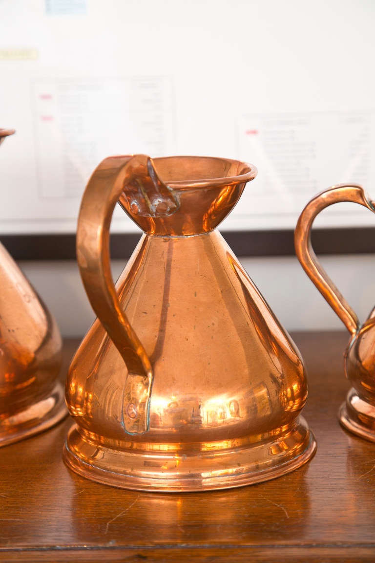 American Set of 9 Copper Measuring Pitchers