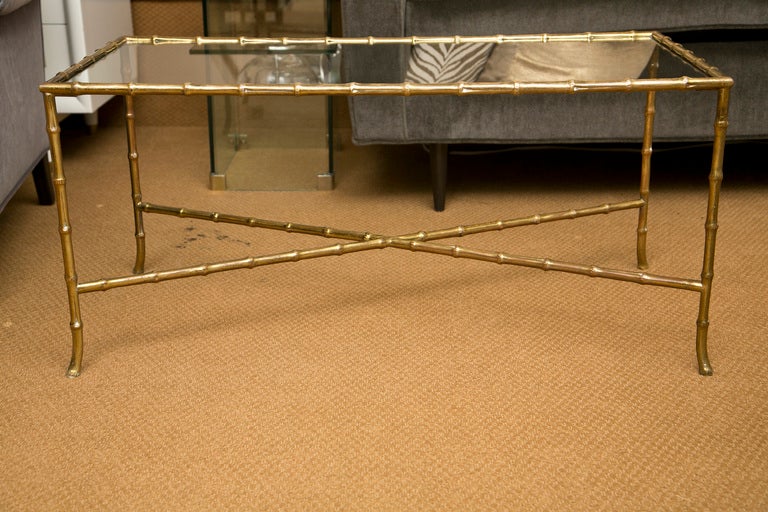 Perfectly proportioned brass Bagues style low table. X-Stretcher base and fine all-over wear commensurate with age.