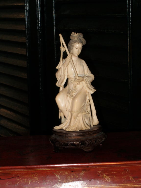 Lovely Chinese Carved Ivory Lady on pedestal.