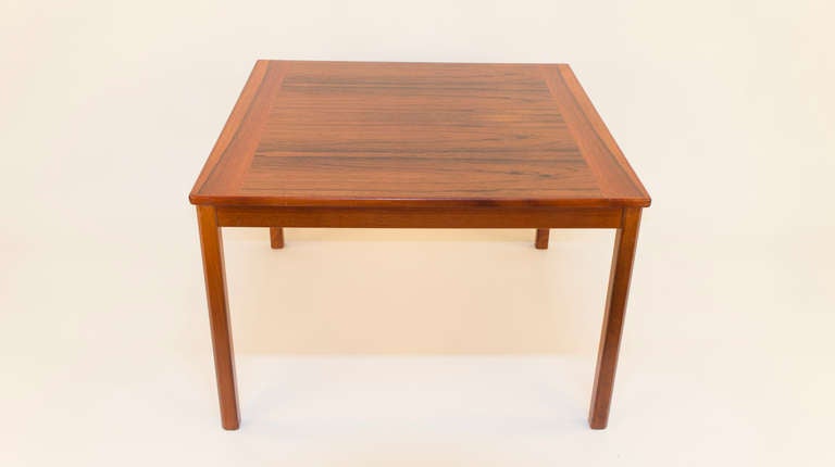 A square table, related to the previous three pieces, as they once all lived together (in harmony) in a spacious home in Gothenburg, Sweden. All followed the tradition of elegance with an exotic flair, coupled with practicality. Crafted of solid