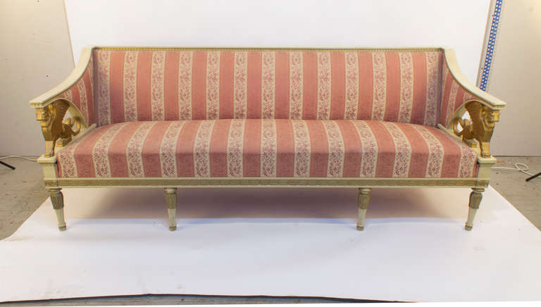 A long and lovely sofa revived from the glorious "Gustaviansk" period which immediately preceded and foreshadowed Biedermeier, Gustavian furniture was usually painted and gilded, with classical style elements. This piece incorporates