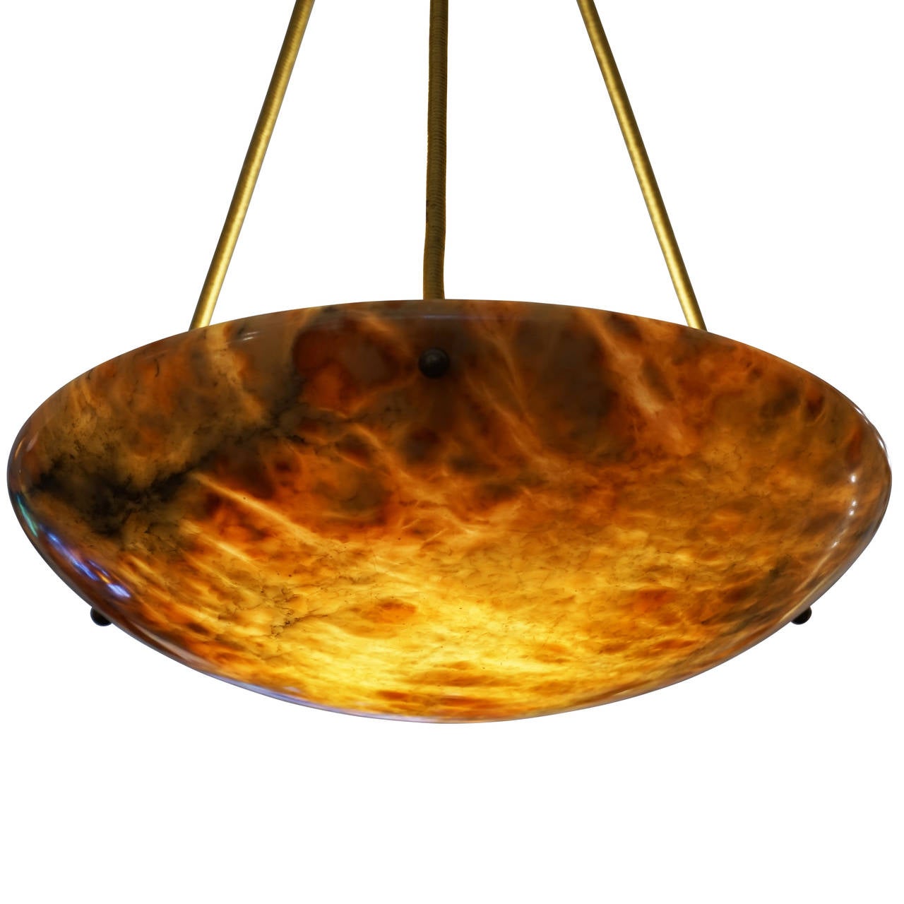 A smooth burning sphere, this fixture is multicolored, with shades of gold, green, dots of amber, fossils, and charcoal mineral veining. Dramatic, yet restrained, by Virtue of its slim profile and medium circumference.