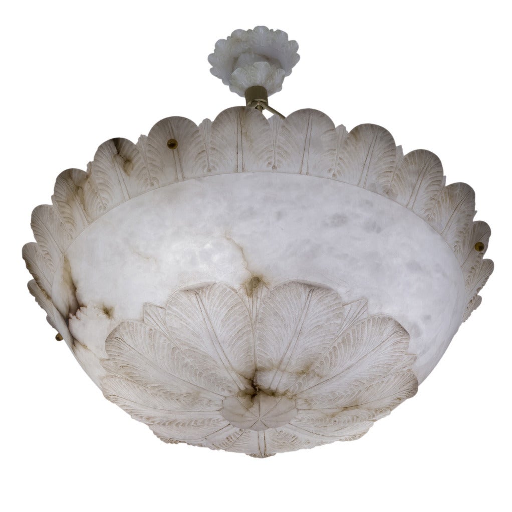 A large floral fixture, custom designed for a nineteenth century home, being retrofitted for electricity at its inception around 1900.  This acanthus leaf adorned light fixture has a perfectly matching canopy, a miniature of the fixture itself.  