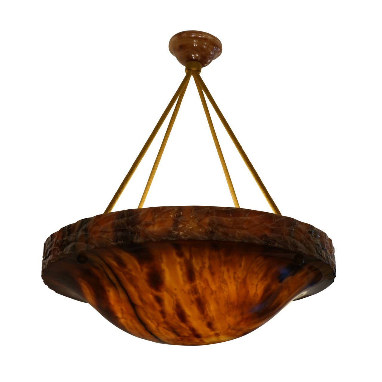 This dramatic fixture of tortoise toned alabaster is actually much brighter than it appears in our photos.  The graceful swooping bowl is met by a 2.5" deep carved laurel wreath.  Recently rewired, on a set of four electrified ropes, the