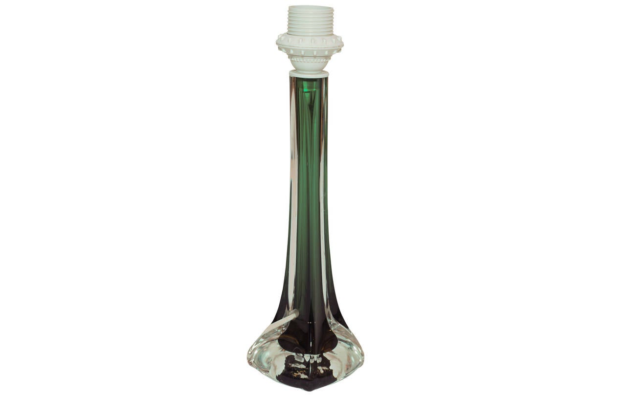 Slim and elegant, these lamps are a tiny bit different from each other, as they are handmade.  Fresh, green glass is encased in clear crystal.  The lamps have been recently rewired, and are signed.   The height measurement is from the base to the