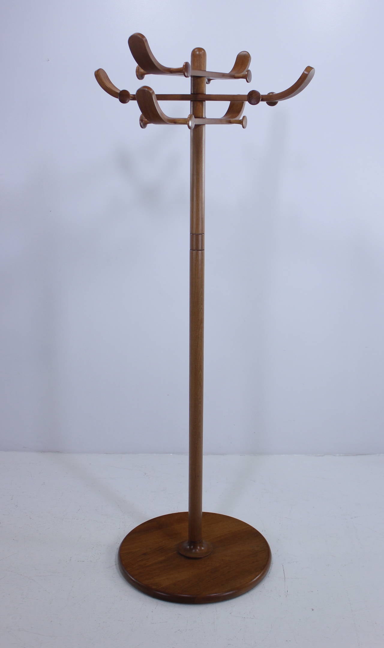 Rare Danish modern coat stand, with nordic flair, designed by Aksel Kjersgaard.
Exceptionally sturdy teak stand accommodates coats, jackets and hats.
Disassembles for easy storage and shipping.
Professionally restored and refinished by