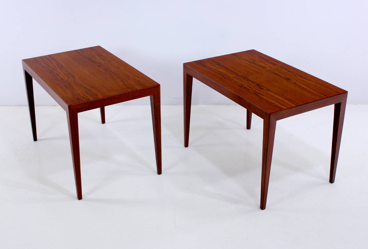 Two exquisite Danish modern end tables designed by Severin Hansen.
Haslev Mobelsnedskeri, maker. Model #43.
Richly grained teak.
Modern minimalism at its best.
Professionally restored and refinished by LookModern.
Matchless quality and