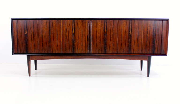 Scandinavian Modern Dramatic Danish Modern Rosewood Credenza with Tambour Doors For Sale