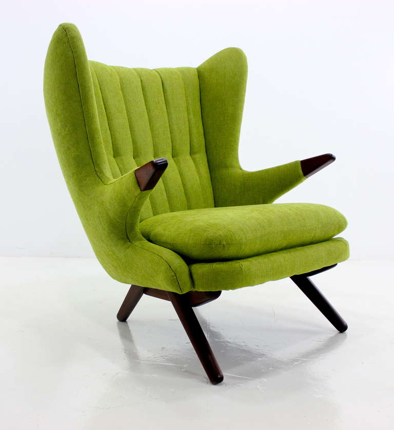 Danish modern armchair designed in 1954 by Svend Skipper for Skipper Furniture.
Exceptional style and comfort.
Teak arm pads and legs.
Newly upholstered in highest quality, vibrant lime, period fabric.
Professionally restored and refinished by
