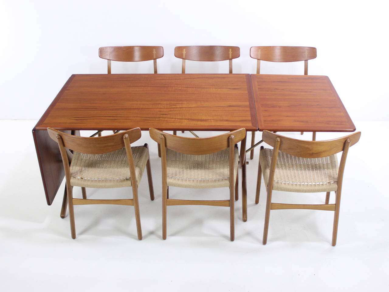 Impressive Danish Modern Teak and Oak Dining Set Designed by Hans Wegner In Excellent Condition For Sale In Portland, OR