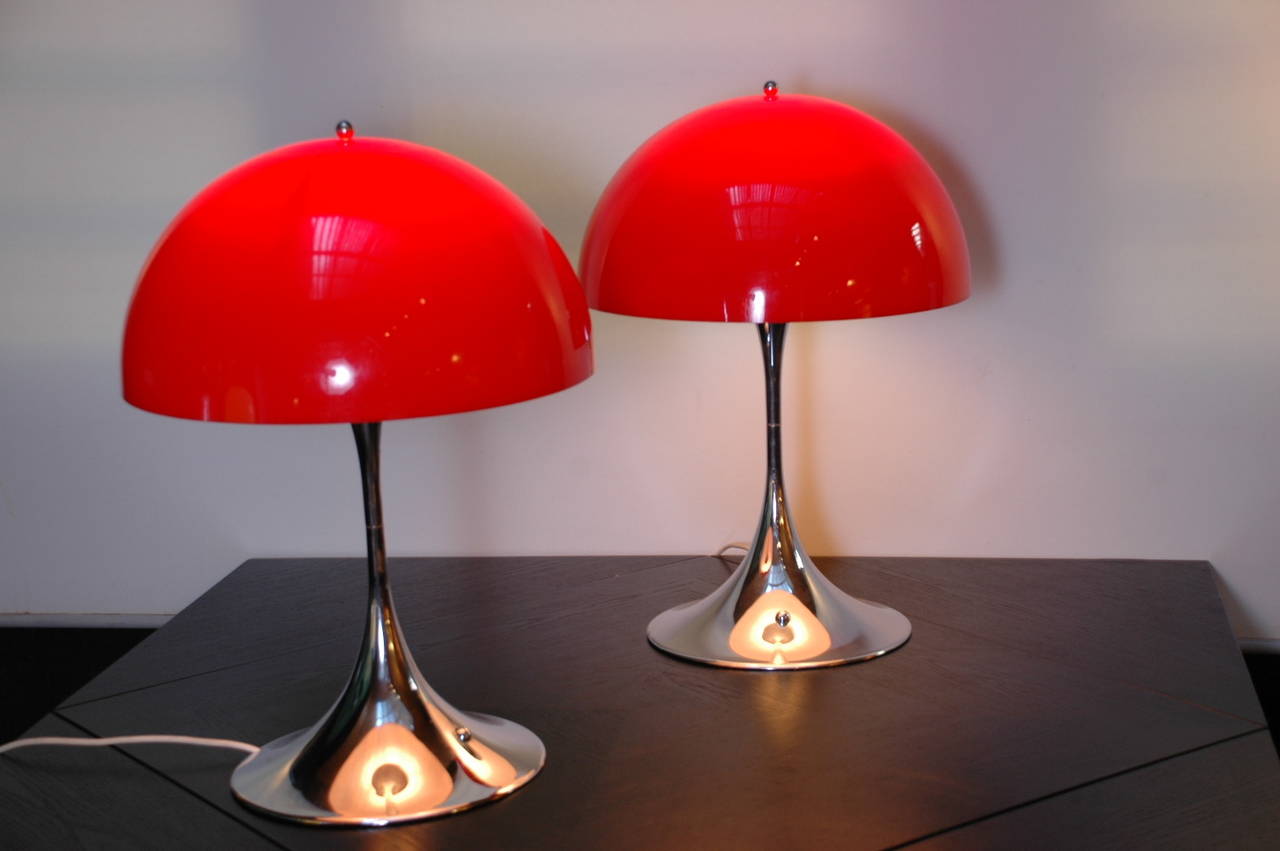 Pair of very rare chromed base with red shade table light Panthella by iconic Danish designer Verner Panton, manufactured by Louis Poulsen in Denmark. These are the original first edition with the on/off switch in the base and large diameter shade.