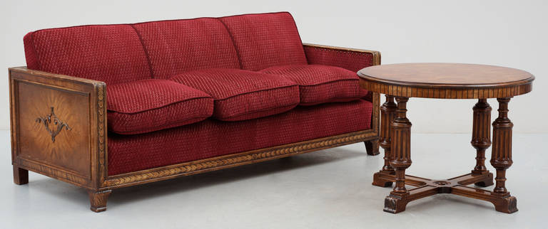 Nice art deco sofa from Stockholm, Sweden.
In stained Birch and red fabric.
Very heavy and solid made.
Comes with matching table