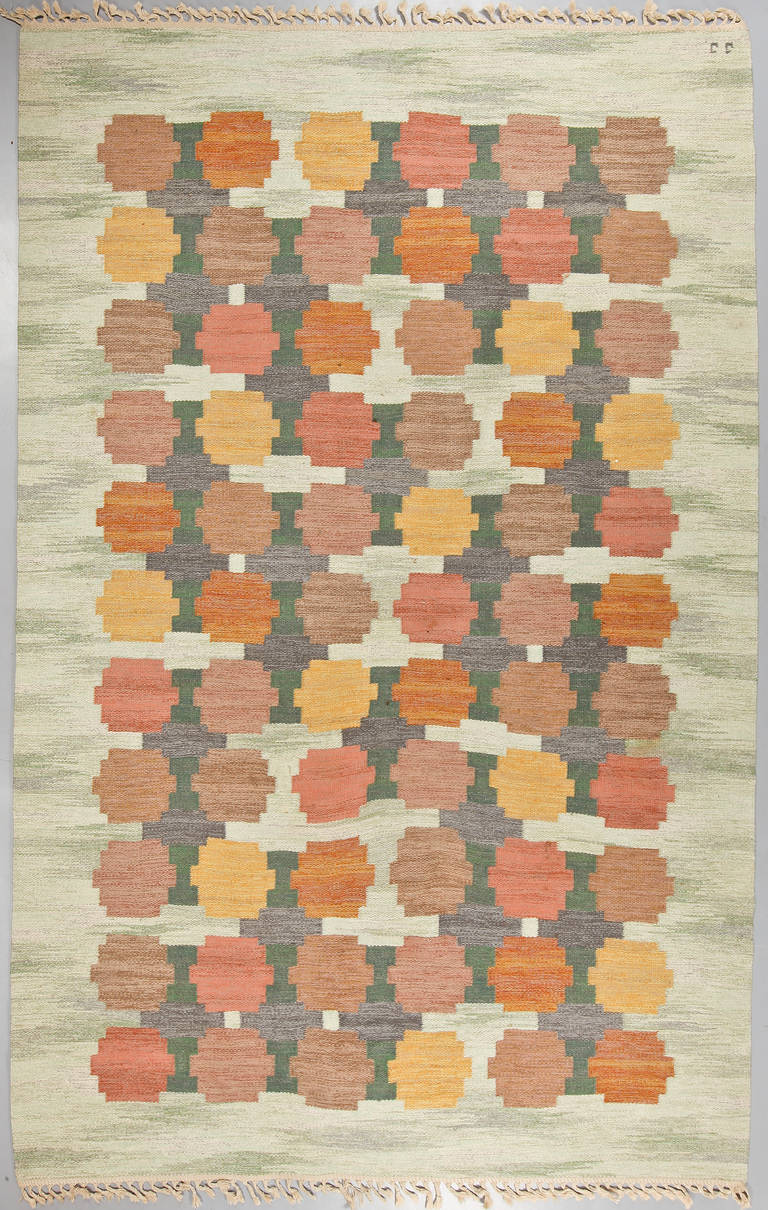 A Vintage Swedish Big Flat Weave rug designed by Judith Johansson.(1916 - 1993).
Size 308 cm - 208 cm.
Judith Johansson founded her own studio with her husband in 1938.
 monogramsigned   : JJ